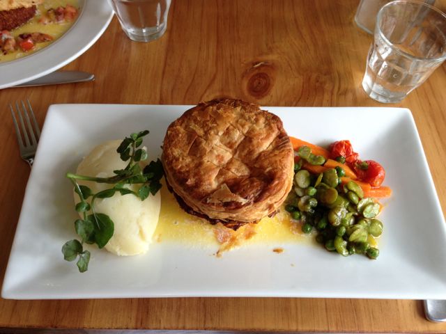 Tarte de Lapin et Truffe. Rabbit, ham & truffle pie served with a ménage of baby vegetables and pomme puree